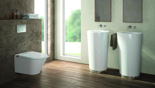 Zu sehen ist ein Modernes Bad mit zwei großen Waschbecken und Spiegel, sowie eine Toilette. Der Boden besteht aus Holz-Laminat.